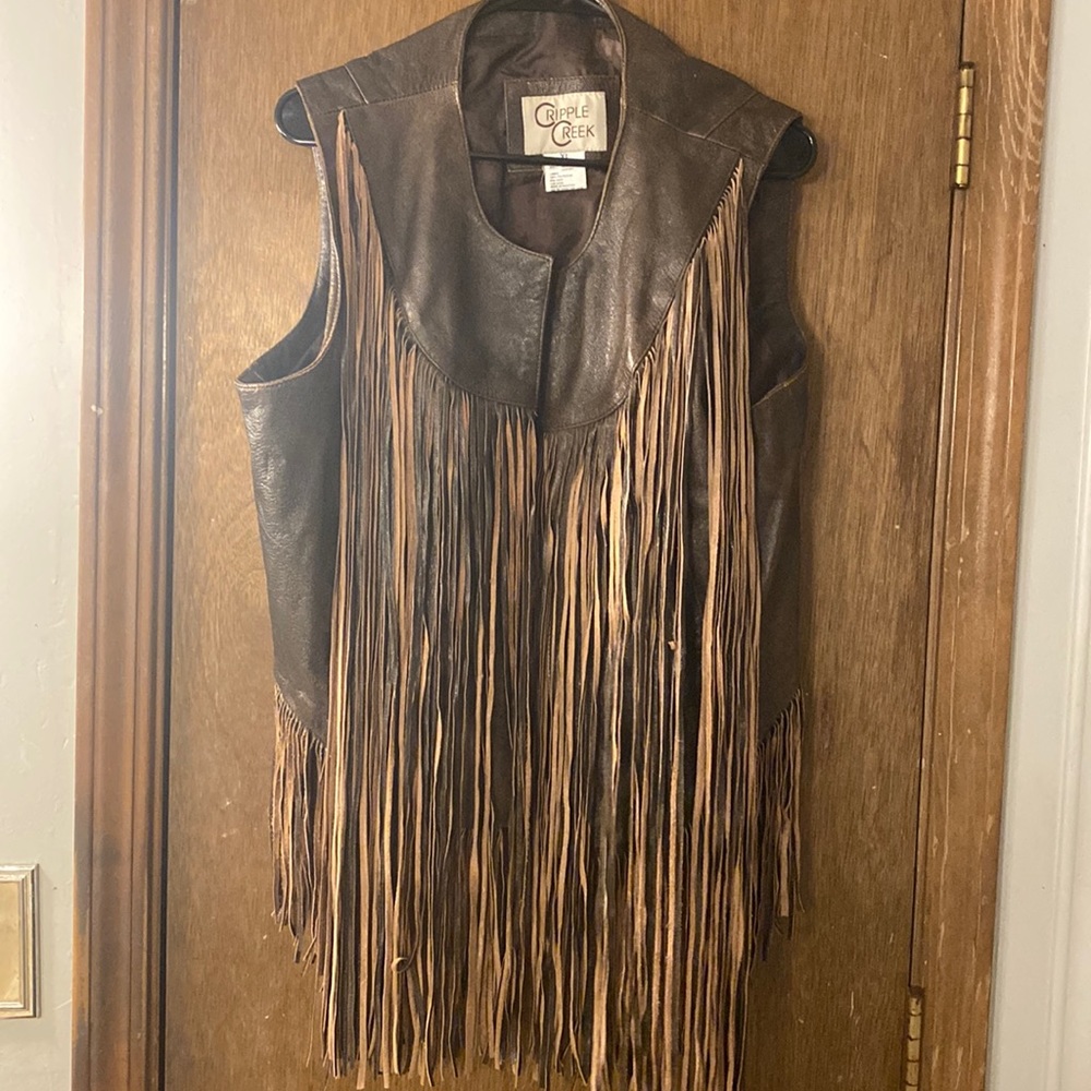I’m selling a leather vest with genuine leather. The brand is cripple creek.